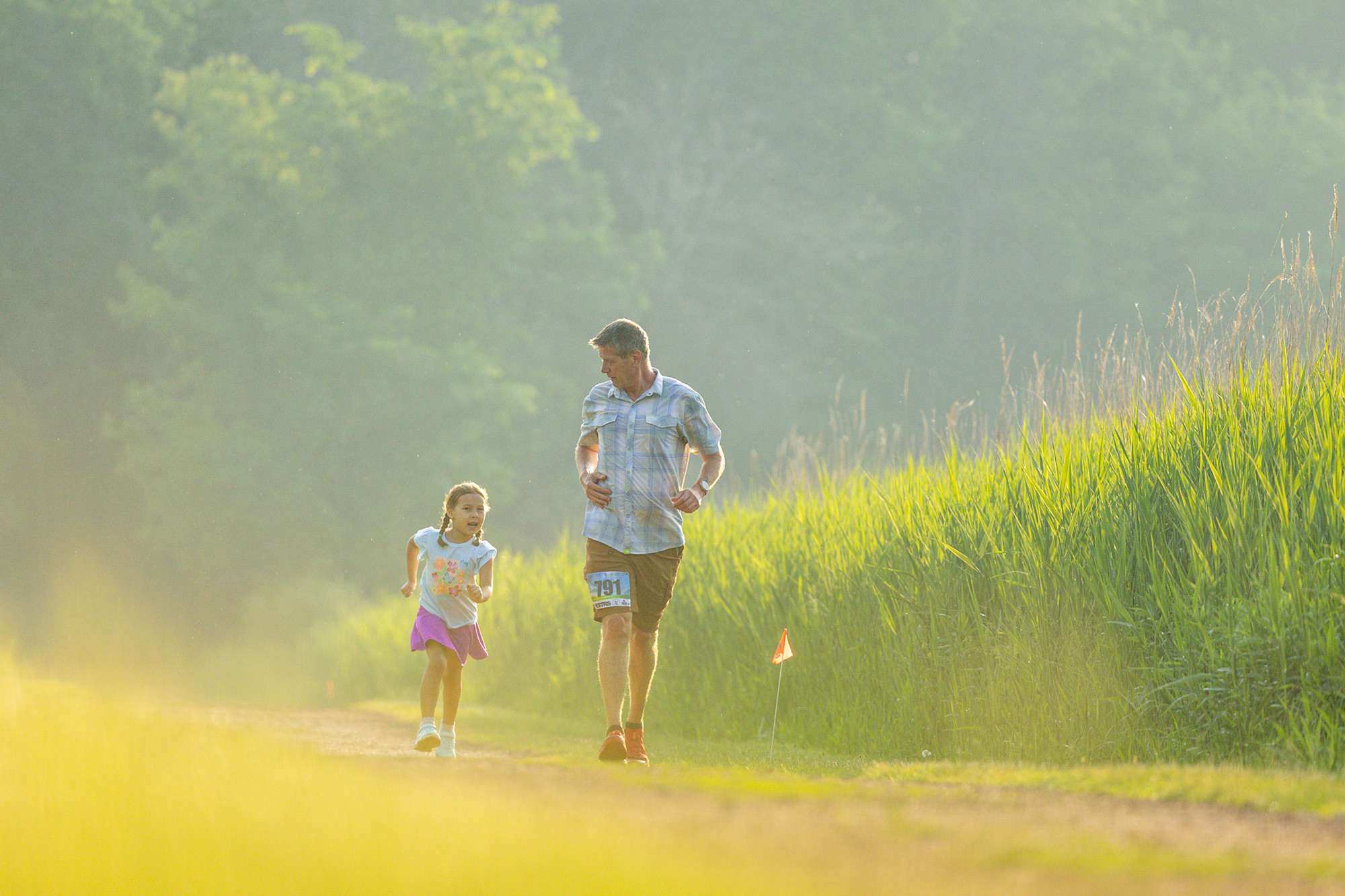 Running with Grandpa at the 2025 ESTRS French 5K - Photo Credit Scott Rokis