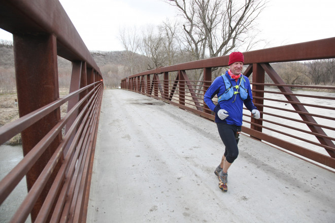 100 Miler Kevin Langton Crossing the Zumbro River - Photo Credit Eric Hadtrath