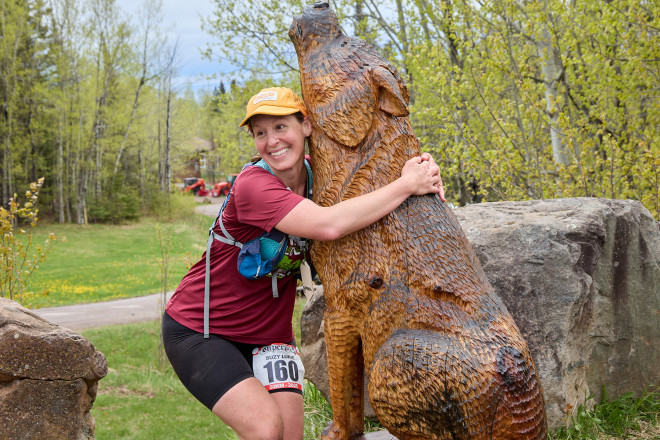 A Hug with the Superior Wolf - Photo Credit Christine Armbruster