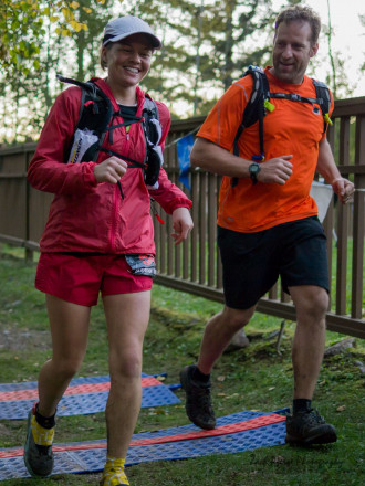 Amy Finishes with Husband and Multi Time Finisher Jason - Photo Credit Zach Pierce