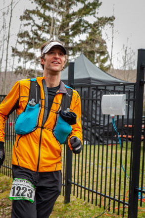 Andrew Broadmoore All Smiles Finishing the 12K - Photo Credit Mike Wheeler