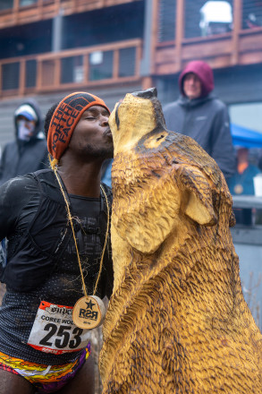 Coree Woltering Kisses the Wolf After His 2019 50K Win - Photo Credit Jamison Swift