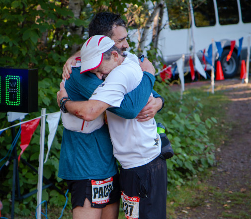 Doug Kleemeier and Pacer Edward Sandor at the Finish of the 2018 Superior 100 - Photo Credit Mike Wheeler