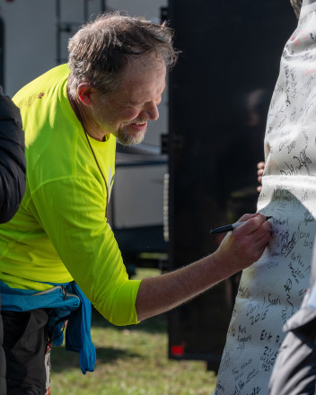 Doug Signing - Photo Credit Anna Woletz