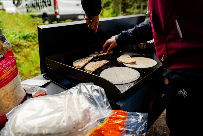 Eating Well at Temperance River Aid Station SFTR 2025 - Photo Credit Katrina Gaisford