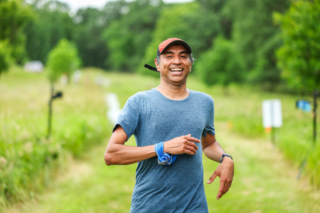 Eduardo All Smiles on the Finish Line in 2025 - Photo Credit Scott Rokis