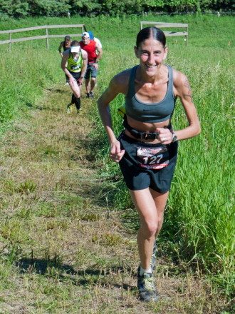 Eve Rembleski Working the Climbs - Photo Credit Jen Pierce