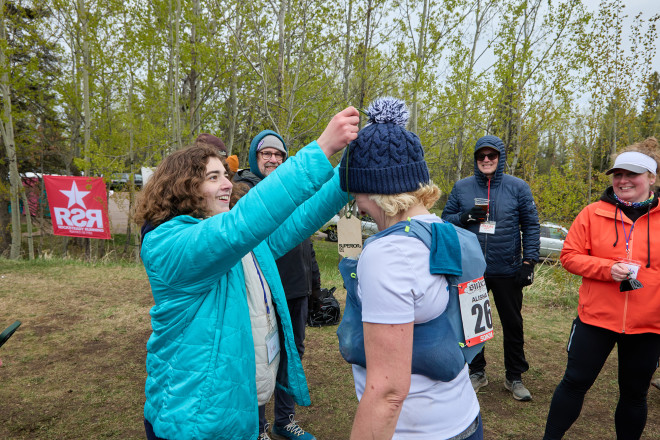 Handing Mom Her Medal - Photo Credit Christine Armbruster