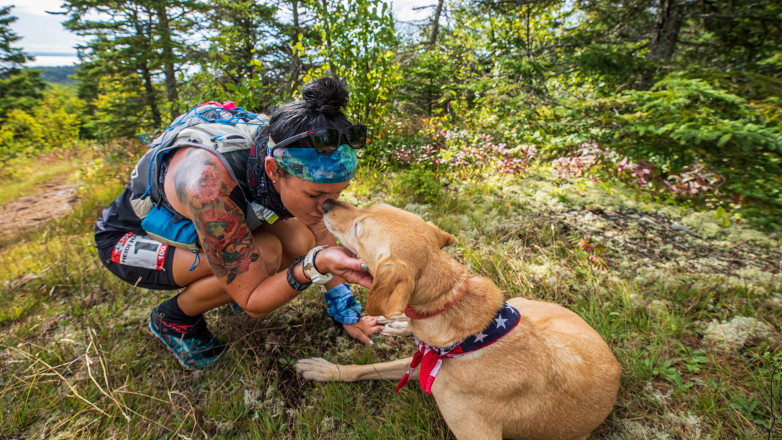 Heidi Gets Some Dog Kisses During the 100 - Photo Credit Tone Coughlin
