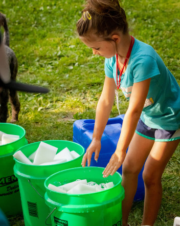 Ice Cold Sponge Volunteer - Photo Credit Mike Wheeler