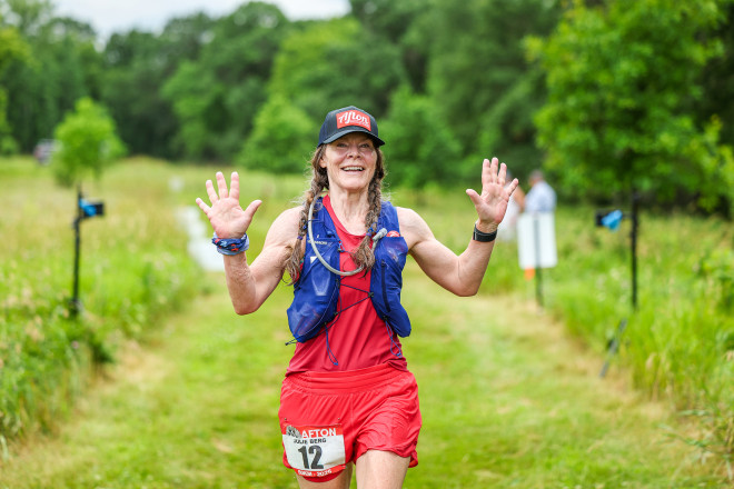 Julie Berg Getting Her 10th Afton 50K Finish in 2025 - Photo Credit Scott Rokis