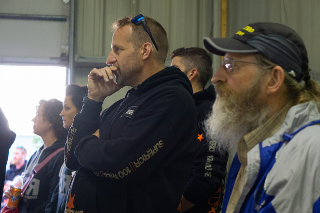 Listening Intently at the 100 Mile Pre-Race Meeting - Photo Credit Jamison Swift
