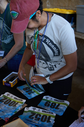 Menaka Helping at Check-In - Photo Credit Christine Armbruster