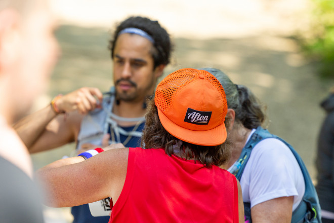 Runners Helping Runners - Photo Credit Scott Rokis