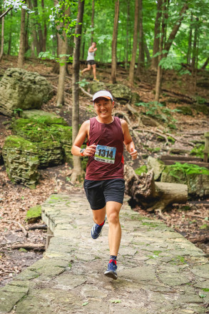Running Happy at ESTRS SLP 5MI in 2025 - Photo Credit Scott Rokis