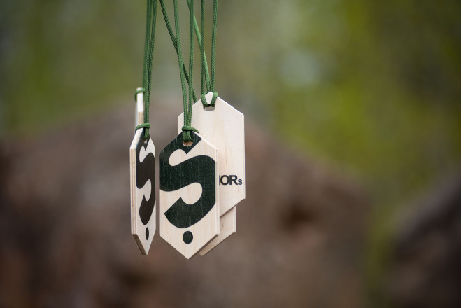 Superior Spring Trail Race Finishers Medal - Photo Credit Bill Kelley