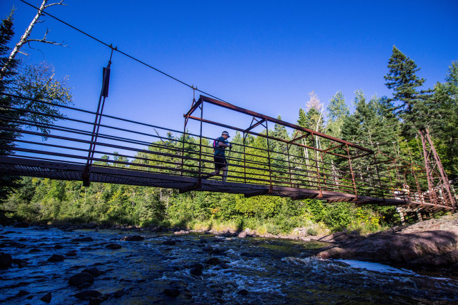 Suspension Bridge Above High Falls Baptisim River Tettegouche State Park - Photo Credit Fresh Tracks Media