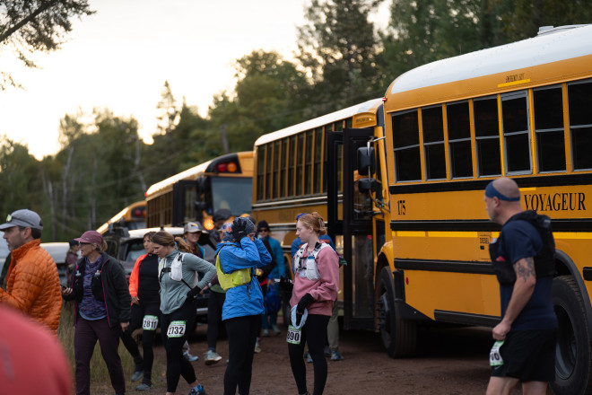 Unloading Buses at the Marathon Start in 2025 - Photo Credit Tryg Solberg